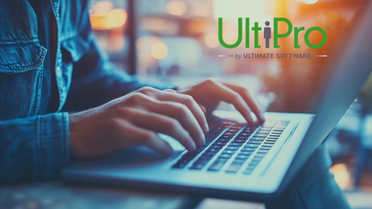 Person's Hands Typing on A Laptop Keyboard with The Ulti Pro Logo Displayed on The Screen, Indicating a Focus on Business Engagement Software